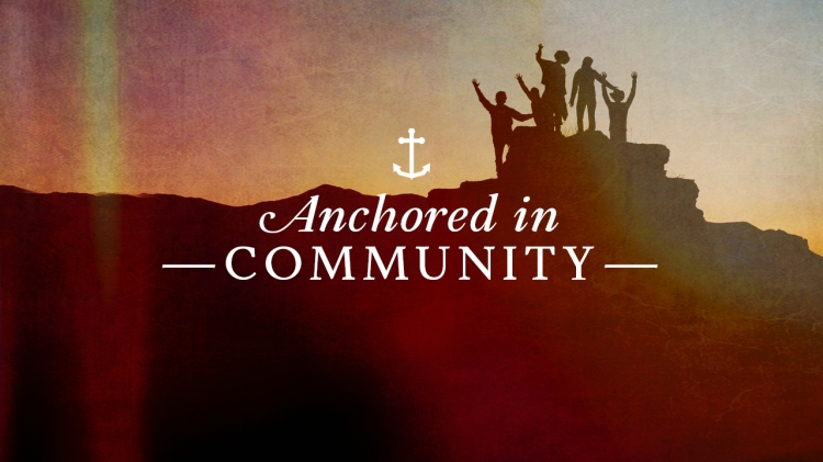 Series - Image of group standing on summit with text overlaid, "Anchored in Community"
